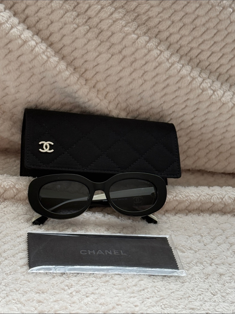 CHANEL Black Oval Sunglasses with Quilted Logo Case and Cloth